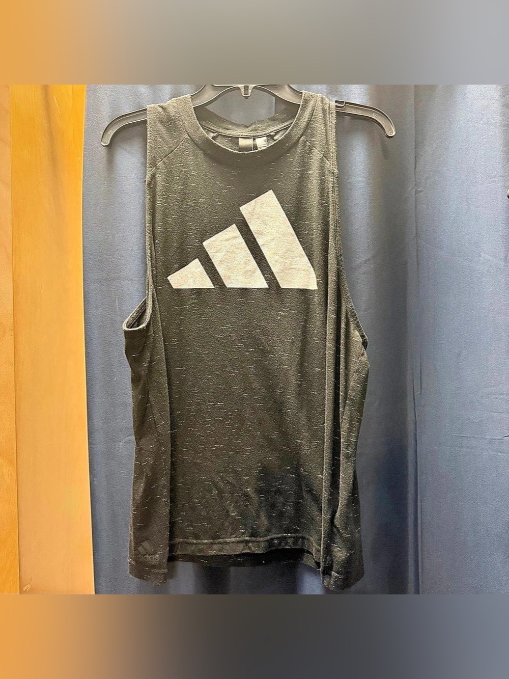 ESSENTIALS WINNERS TANK TOP